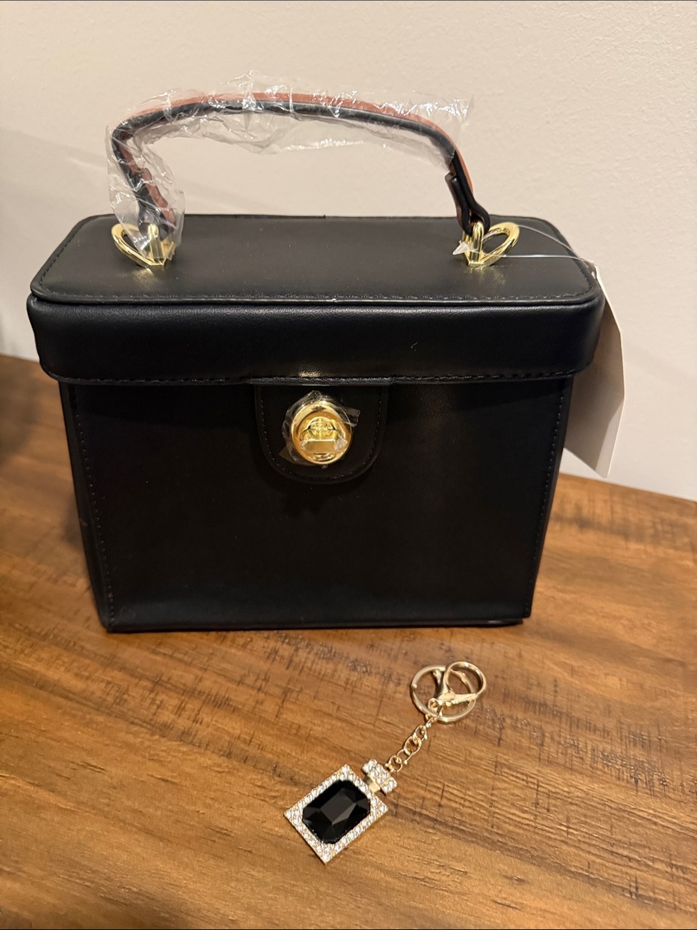 Classic Black Top-Handle Women's Bag with Gold Hardware